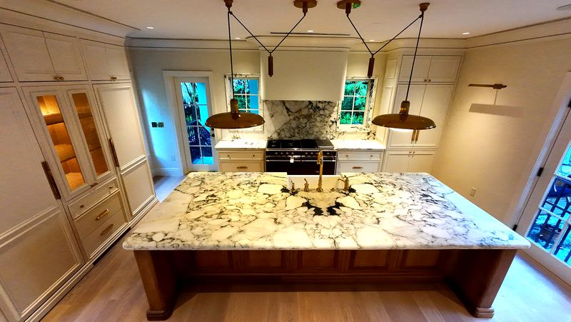 Kitchen remodel with marble island and custom cabinetry